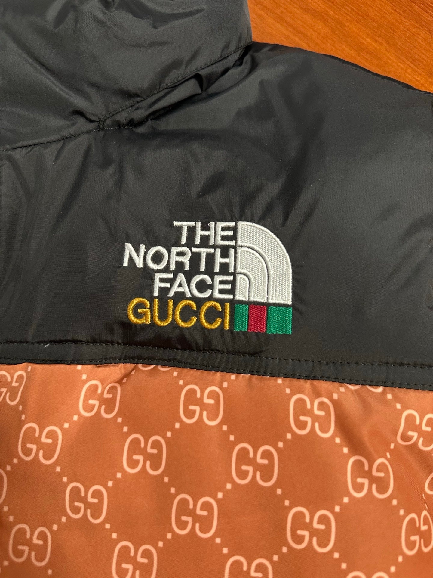 North Face and Gucci's joint down Giacca